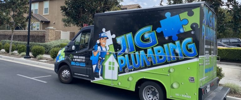 JIG Plumbing van parked at service location