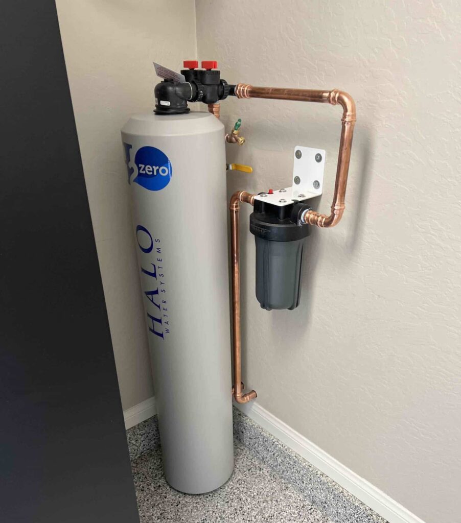 Newly installed HALO whole house water filtration and conditioning system with connected copper piping